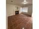 Cozy living room showcasing a fireplace, tile flooring, and bright natural light at 5115 Blossom Ave, Las Vegas, NV 89142