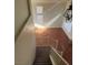 Open living space featuring a staircase, terra-cotta floors, high ceilings, and abundant natural light at 5115 Blossom Ave, Las Vegas, NV 89142