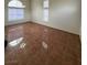 Spacious living room featuring tile flooring, large windows, and ample natural light at 5115 Blossom Ave, Las Vegas, NV 89142