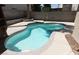 Backyard inground pool with lush landscaping and privacy walls at 5115 Blossom Ave, Las Vegas, NV 89142