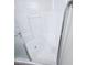 Clean white shower featuring built-in seating and clear glass door enclosure at 5115 Blossom Ave, Las Vegas, NV 89142