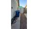 View of backyard, featuring gravel and a trash receptacle at 5284 Wellesley Ave, Las Vegas, NV 89122