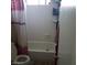 Cozy bathroom featuring a shower-tub combo and a patterned shower curtain at 5284 Wellesley Ave, Las Vegas, NV 89122