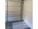 Garage featuring neutral walls and a standard garage door at 5284 Wellesley Ave, Las Vegas, NV 89122
