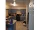 Kitchen area showcasing ample counter space, gas range and light blue cabinets providing a clean and functional space at 5284 Wellesley Ave, Las Vegas, NV 89122