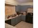 Kitchen area showcasing ample counter space, gas range and light blue cabinets providing a clean and functional space at 5284 Wellesley Ave, Las Vegas, NV 89122