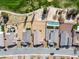 Aerial view of properties showing pools, landscaping, and a golf course in the background at 5467 Eleganza Ave, Pahrump, NV 89061