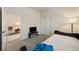 Comfortable bedroom with neutral carpet, a slider closet, a daybed, and soft lighting at 5467 Eleganza Ave, Pahrump, NV 89061