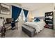 Cozy bedroom featuring carpet, gray walls, and complementary bedding and curtains at 5467 Eleganza Ave, Pahrump, NV 89061