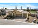 Stunning single-story home featuring a three-car garage and meticulously landscaped front yard in a vibrant community at 5467 Eleganza Ave, Pahrump, NV 89061