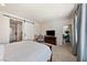 Spacious main bedroom featuring a barn door and an ensuite bathroom at 5467 Eleganza Ave, Pahrump, NV 89061
