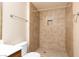 Bathroom featuring tile shower and a toilet at 5855 Valley Dr # 1107, North Las Vegas, NV 89031