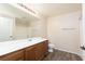 Bathroom featuring a large vanity, spacious counter, and shower with sliding doors at 5855 Valley Dr # 1107, North Las Vegas, NV 89031