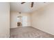 Comfortable bedroom with neutral carpet and access to the on-suite bathroom at 5855 Valley Dr # 1107, North Las Vegas, NV 89031