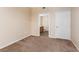 Bedroom with neutral paint, plush carpeting, and ensuite bathroom at 5855 Valley Dr # 1107, North Las Vegas, NV 89031