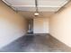 Spacious garage features an automatic door opener, water heater, and interior access door at 5855 Valley Dr # 1107, North Las Vegas, NV 89031