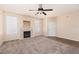 Spacious living room with fireplace, carpet, and hardwood flooring at 5855 Valley Dr # 1107, North Las Vegas, NV 89031