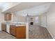 Open concept kitchen and living area featuring breakfast bar and fireplace at 5855 Valley Dr # 1107, North Las Vegas, NV 89031