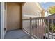Covered patio offers private outdoor living space with white railing at 5855 Valley Dr # 1107, North Las Vegas, NV 89031