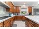 Traditional kitchen with stainless steel appliances, beautiful cabinets and countertops and attractive backsplash at 5872 Revital Ct, Las Vegas, NV 89131
