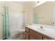 Bathroom with a shower-tub combo, a single sink vanity, and neutral wall color at 5934 Reflection Point Ct, Las Vegas, NV 89110