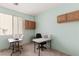 Bright office with two desks, providing a functional workspace at 5934 Reflection Point Ct, Las Vegas, NV 89110