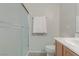 Bathroom featuring a glass shower stall, a sink, and a decorative towel rack at 6059 Saddle Horse Ave, Las Vegas, NV 89122