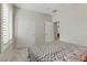 Comfortable bedroom with lots of natural light features a closet and carpeted floor at 6059 Saddle Horse Ave, Las Vegas, NV 89122