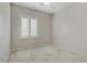 Well-lit bedroom with neutral tones features a shuttered window and carpeted floors at 6059 Saddle Horse Ave, Las Vegas, NV 89122