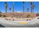 Entrance to the community center, with prominent signage and lush landscaping at 6059 Saddle Horse Ave, Las Vegas, NV 89122