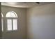 Bright bedroom features a large window with custom shutters at 6120 Matisse Ave, Las Vegas, NV 89131