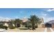 Charming home with tile roof, desert landscaping, and a gated driveway entrance at 6120 Matisse Ave, Las Vegas, NV 89131