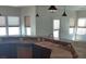 Kitchen with granite counters, stainless appliances, and lots of windows at 6120 Matisse Ave, Las Vegas, NV 89131