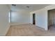 Large carpeted bedroom with plenty of space and natural light from the window at 6134 Pine Villa Ave # 103, Las Vegas, NV 89108