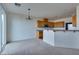 A dining area next to an open kitchen offers a cozy space for meals and entertaining with an open floorplan at 6134 Pine Villa Ave # 103, Las Vegas, NV 89108