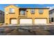 Three-car garage with potential for ample storage, a work area, and parking at 6134 Pine Villa Ave # 103, Las Vegas, NV 89108