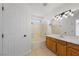 Bathroom with a shower-tub combination and wooden vanity at 6328 Brianna Peak Ct, Las Vegas, NV 89142