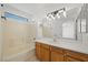 Bathroom with shower-tub combination, tile flooring, and a view to another room at 6328 Brianna Peak Ct, Las Vegas, NV 89142
