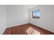 Bedroom with hardwood floors and a view of the street at 6328 Brianna Peak Ct, Las Vegas, NV 89142