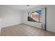 Bright bedroom with large window overlooking a pool with rock features at 6328 Brianna Peak Ct, Las Vegas, NV 89142