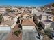 Charming single-Gathering home with a two-car garage and desert landscaping in a residential neighborhood at 6328 Brianna Peak Ct, Las Vegas, NV 89142