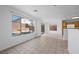 Bright living area with tile floor, natural light, and pool view at 6328 Brianna Peak Ct, Las Vegas, NV 89142