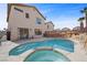 Backyard featuring a beautiful pool with stone accents at 6328 Brianna Peak Ct, Las Vegas, NV 89142