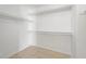 Walk-in closet with built-in shelving and tile flooring at 6328 Brianna Peak Ct, Las Vegas, NV 89142