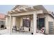 Covered patio with outdoor seating, perfect for relaxing or entertaining guests at 6445 Glory Rise Ct, Las Vegas, NV 89142