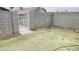 Fenced backyard with low-maintenance artificial turf at 6445 Glory Rise Ct, Las Vegas, NV 89142