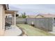 Private backyard with patio space and artificial turf at 6445 Glory Rise Ct, Las Vegas, NV 89142
