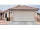 Charming single-story home featuring a well-maintained front yard and attached two-car garage at 6445 Glory Rise Ct, Las Vegas, NV 89142