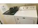 Bright laundry room features a Whirlpool washer and a Maytag dryer at 6445 Glory Rise Ct, Las Vegas, NV 89142