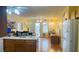 Open-concept living room flowing into the kitchen and dining area, perfect for entertaining at 6445 Glory Rise Ct, Las Vegas, NV 89142